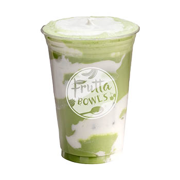 Clear plastic cup with a layered green and white drink, topped with cream, with Frutta Bowls logo on a light gray background.